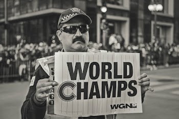 Monochrome Photo of Man Holding Signage