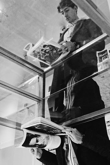 Monochrome Photo Of Man Reading Book