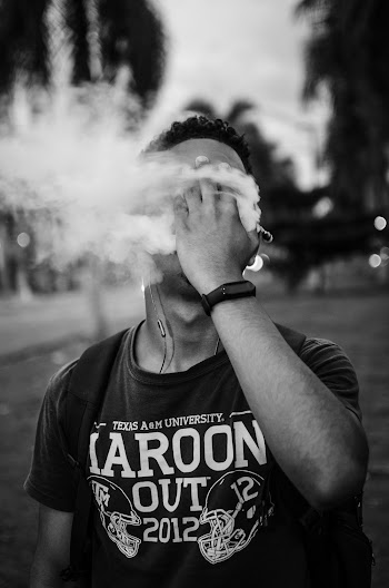 Monochrome Photo Of Man Smoking Vape