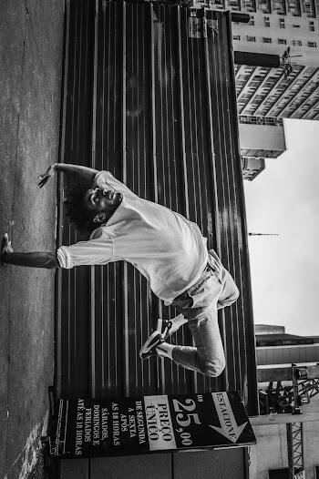 Monochrome Photo Of Man Touching Ground