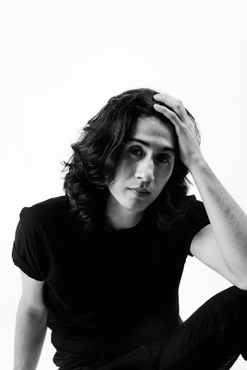 Monochrome Photo Of Man Touching His Hair