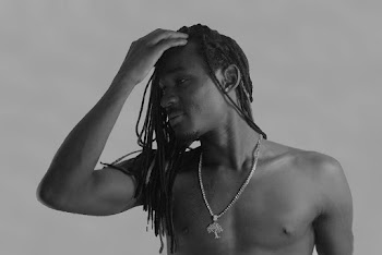 Monochrome Photo of Man Touching His Head