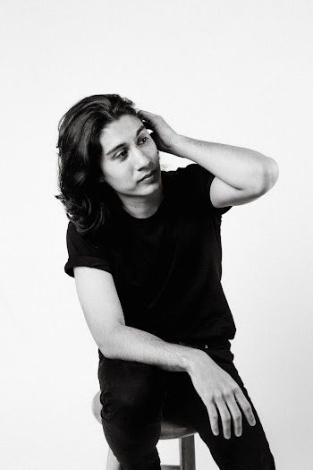 Monochrome Photo of Man Wearing Black Shirt