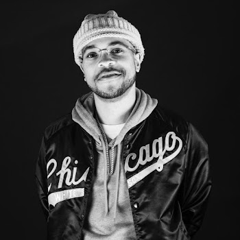Monochrome Photo of Man Wearing Bonnet