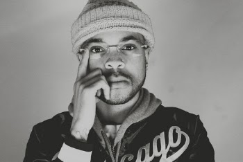 Monochrome Photo of Man Wearing Bonnet