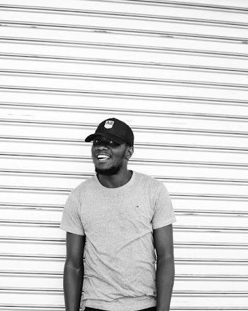 Monochrome Photo of Man Wearing Cap