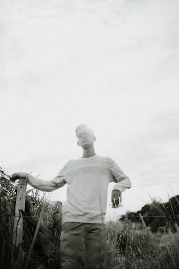 Monochrome Photo of Man Wearing Sweater