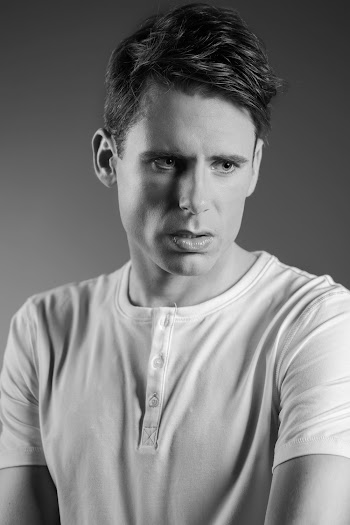 Monochrome Photo of Man Wearing T-Shirt