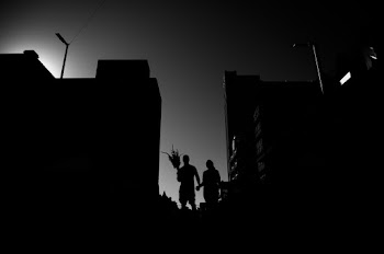 Monochrome Photo of People Holding Hands