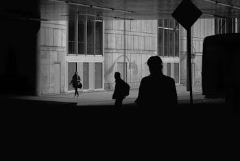 Monochrome Photo of People Walking at the Street