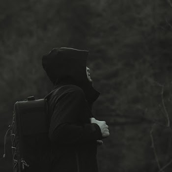 Monochrome Photo of Person Wearing Black Jacket