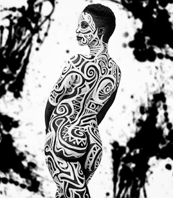 Monochrome Photo of Person With Face and Body Art