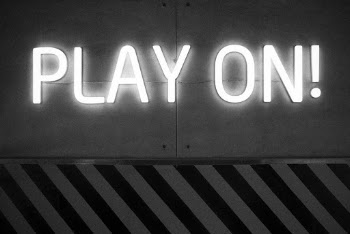 Monochrome Photo of Play On Signage