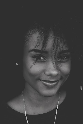 Monochrome Photo of Smiling Woman