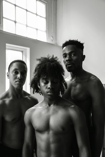 Monochrome Photo of Three Topless Men