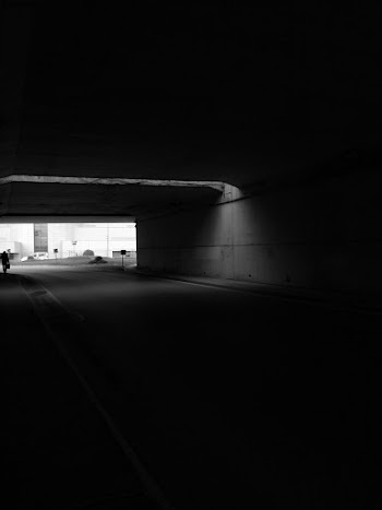 Monochrome Photo of Tunnel