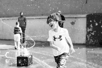 Monochrome Photo of Wet Boy