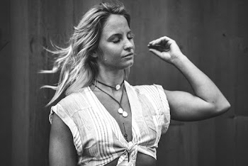 Monochrome Photo of Woman Closing Her Eyes