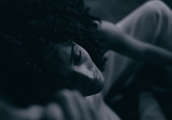 Monochrome Photo Of Woman Closing Her Eyes