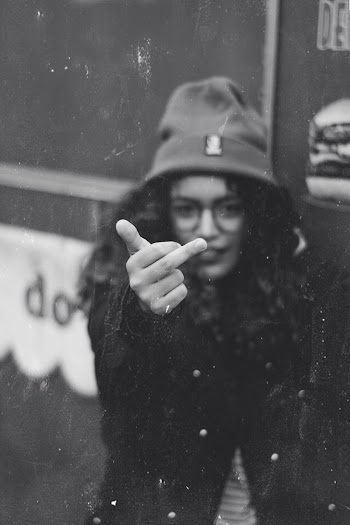 Monochrome Photo Of Woman Doing Hand Sign 