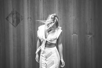 Monochrome Photo of Woman Flipping Her Hair