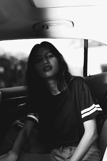 Monochrome Photo Of Woman Inside The Car