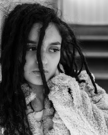 Monochrome Photo of Woman Looking Away