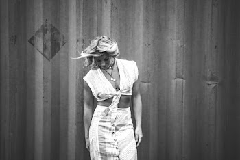 Monochrome Photo of Woman Looking Down