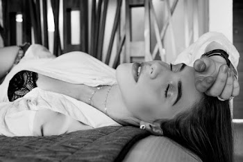Monochrome Photo of Woman Lying Down