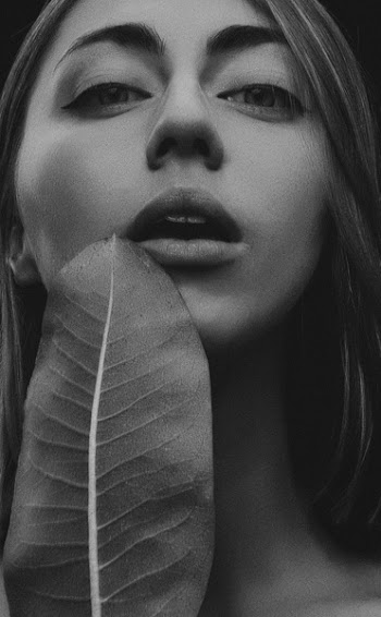 Monochrome Photo of Woman Opening Her Mouth