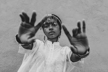 Monochrome Photo of Woman Reaching Her Hands Forward