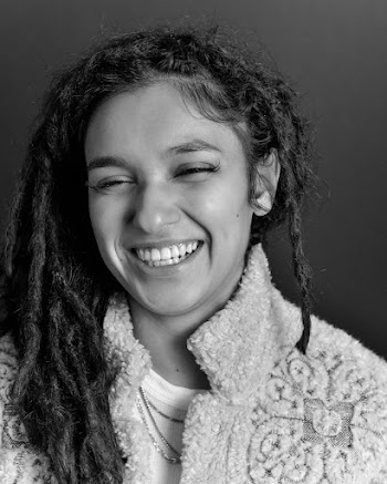 Monochrome Photo of Woman Smiling