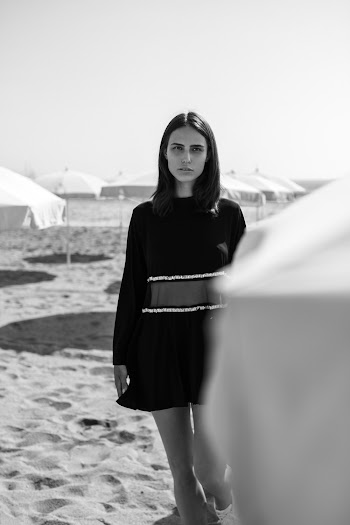 Monochrome Photo Of Woman Standing On The Beach