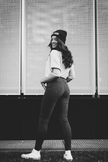Monochrome Photo of Woman Wearing Beanie