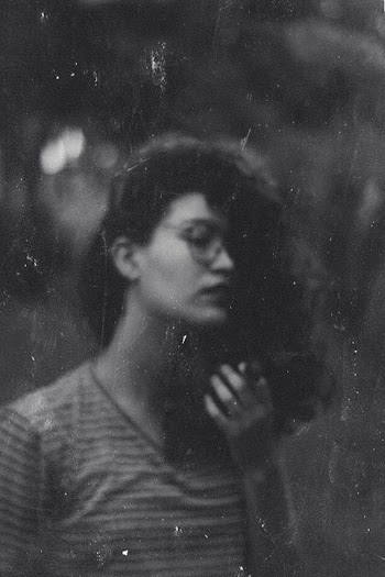 Monochrome Photo of Woman Wearing Black and Gray Striped Crew-neck Top