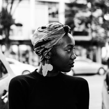 Monochrome Photo of Woman Wearing Earring