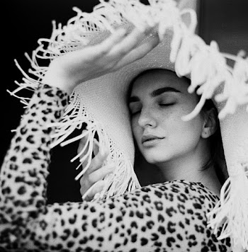 Monochrome Photo of Woman Wearing Hat