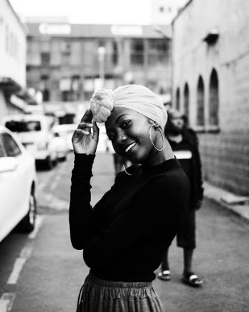 Monochrome Photo of Woman Wearing Headscarf