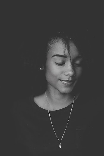 Monochrome Photo of Woman Wearing Necklace