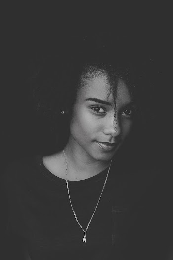 Monochrome Photo of Woman Wearing Necklace