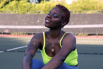 Monochrome Photo Of Woman Wearing Neon Tank Top