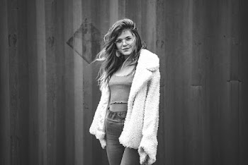 Monochrome Photo of Woman Wearing Sheepskin Coat