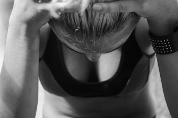 Monochrome Photo of Woman Wearing Sports Bra
