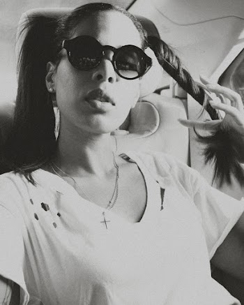 Monochrome Photo of Woman Wearing Sunglasses