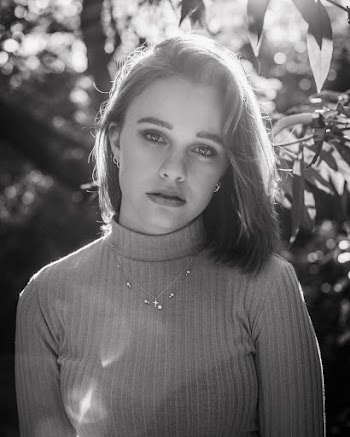 Monochrome Photo of Woman Wearing Turtleneck