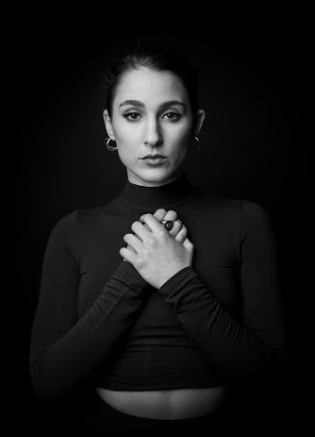 Monochrome Photo of Woman Wearing Turtleneck Top