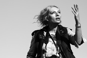 Monochrome Photo of Woman Wearing Vest