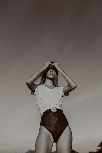 Monochrome Photo Of Woman Wearing White Top