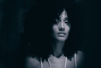 Monochrome Photo Of Woman With Curly Hair