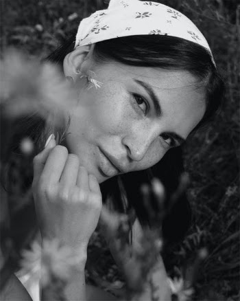 Monochrome Photograph of a Woman with Freckles Wearing a Headscarf · Free Stock Photo